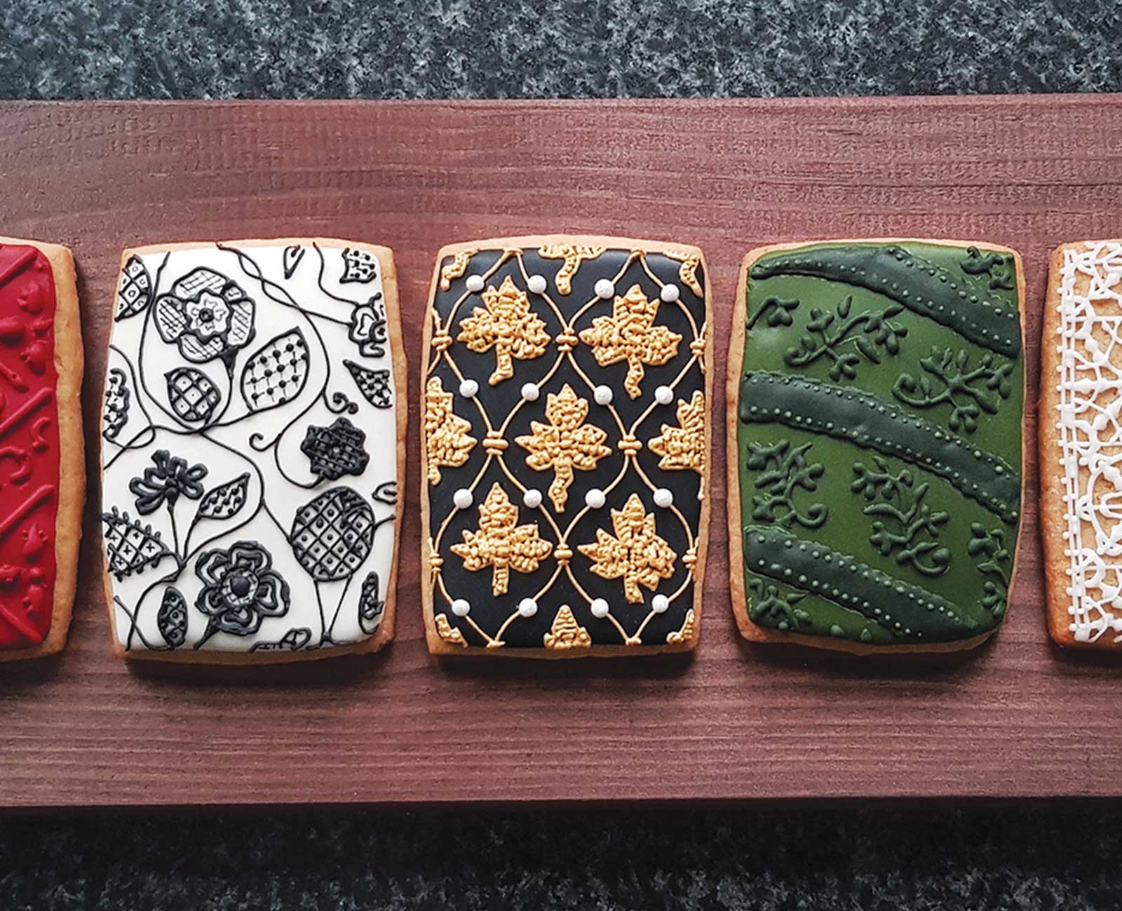 Shakespeare scholar Ella Hawkins bakes and designs intricately decorated cookies (or biscuits) that take a page from antiquarian books and medieval manuscripts.